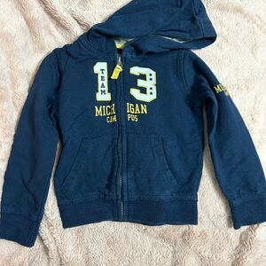 Blue and Yellow Hooded Sweatshirt with Graphics and Full-Length Zipper